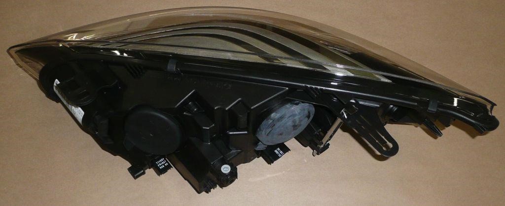 Headlight right Renault 26 01 009 23R