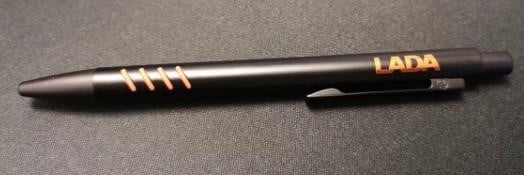 Lada 77771-0290263-00 Black ballpoint pen with orange engraving "Lada", length 13 cm. 77771029026300
