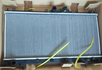 Engine radiator Mitsubishi Eclipse: 5246081 Polcar Engine cooling radiator
