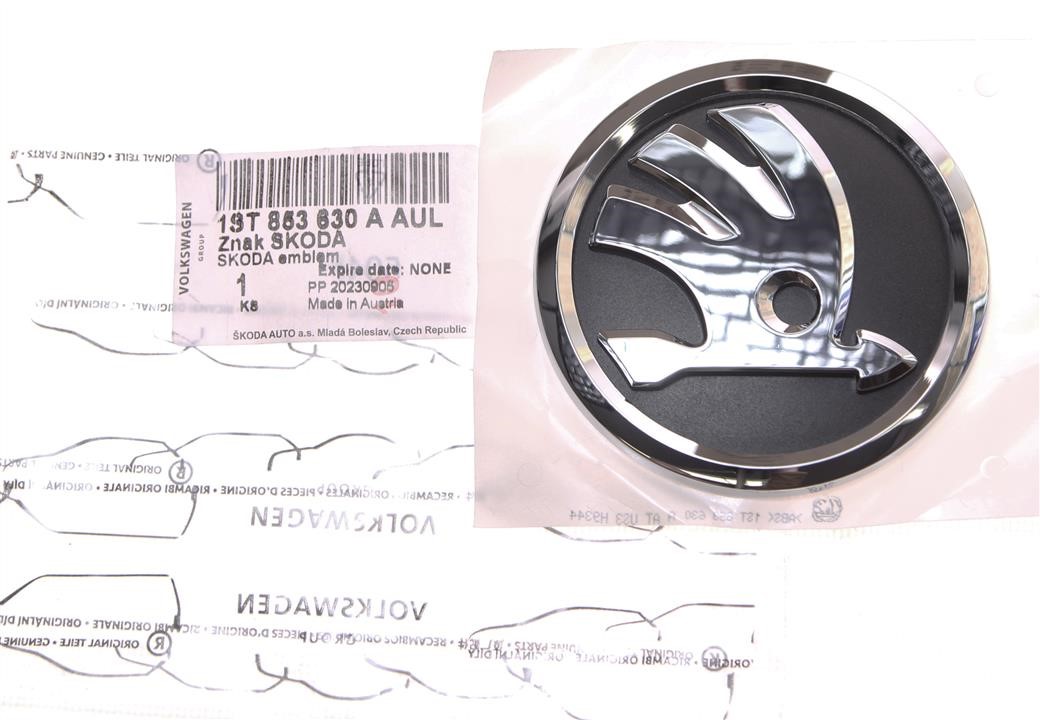 Emblem VAG 1ST 853 630 A AUL