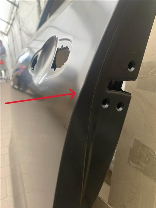 Door rear left - Damage dent Toyota 67004-KK011-DEFECT